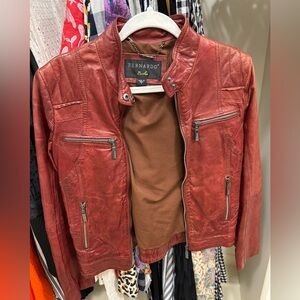 Red Leather Bernardo jacket. Size small. Only worn a couple of times. Like new.
